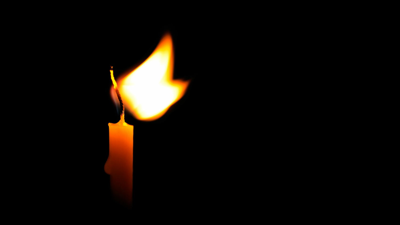 candle isolated on a black background